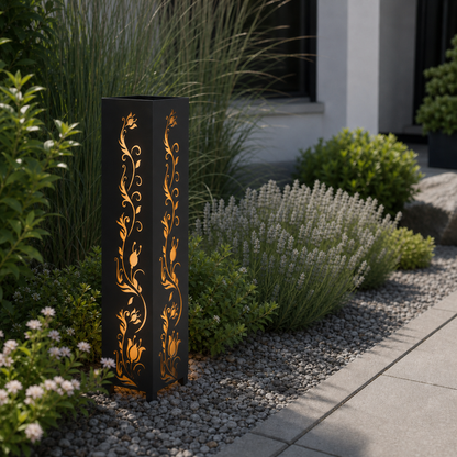 Design 123 laser cut garden light pillar installed in landscaped patio during daytime