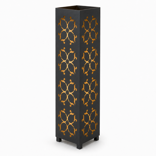 Design 130 black laser cut metal garden light tower with warm LED glow on white background