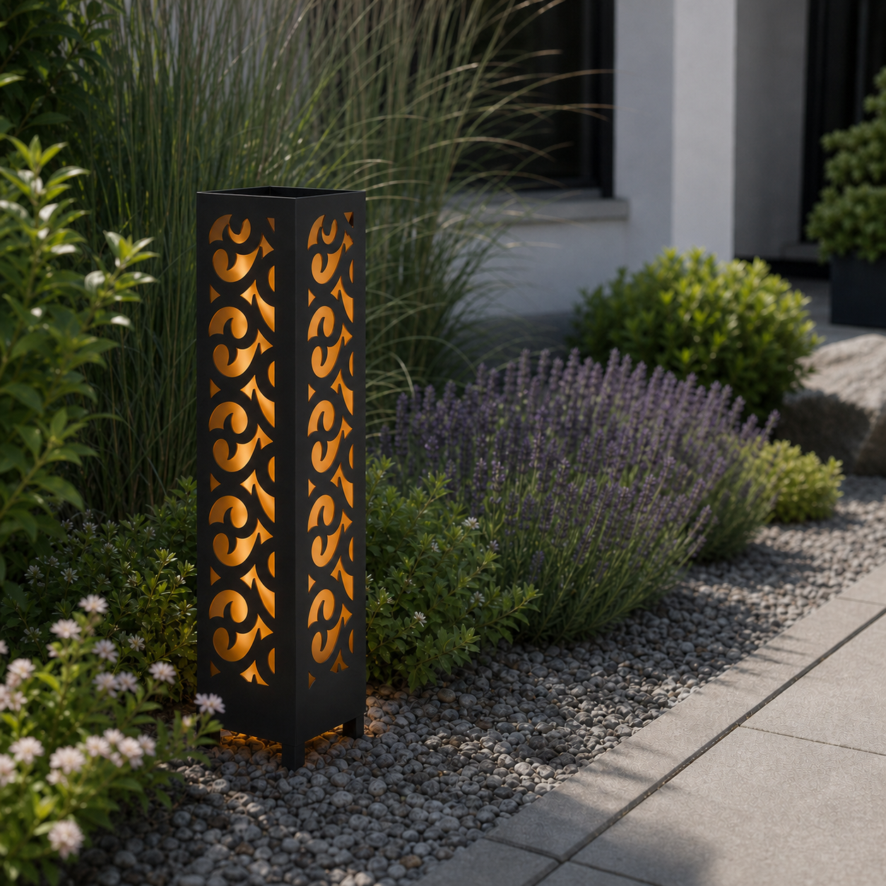 Design 132 laser cut garden light pillar installed in landscaped patio during daytime
