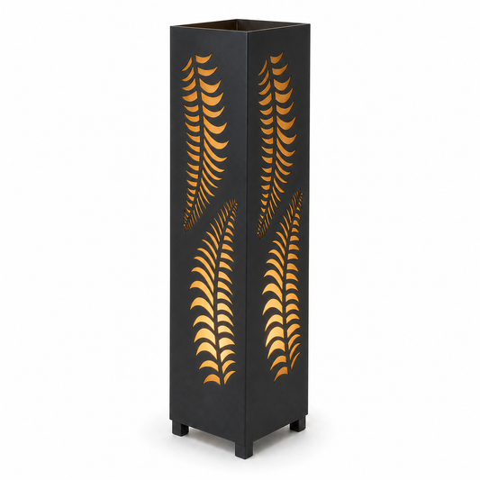 Design 133 black laser cut metal garden light tower with warm LED glow on white background