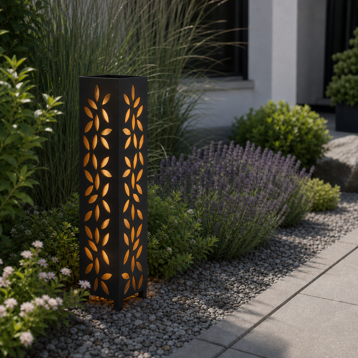 Design 134 laser cut garden light pillar installed in landscaped patio during daytime