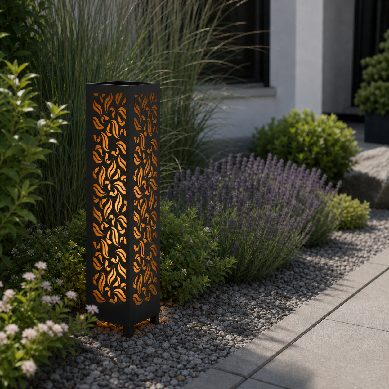 Design 135 laser cut garden light pillar installed in landscaped patio during daytime