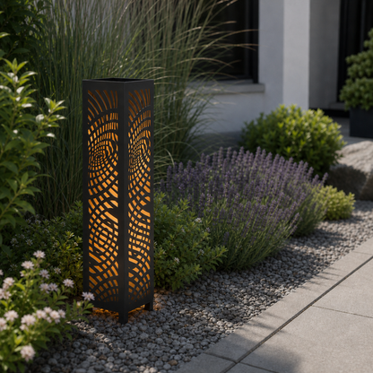 Design 137 laser cut garden light pillar installed in landscaped patio during daytime
