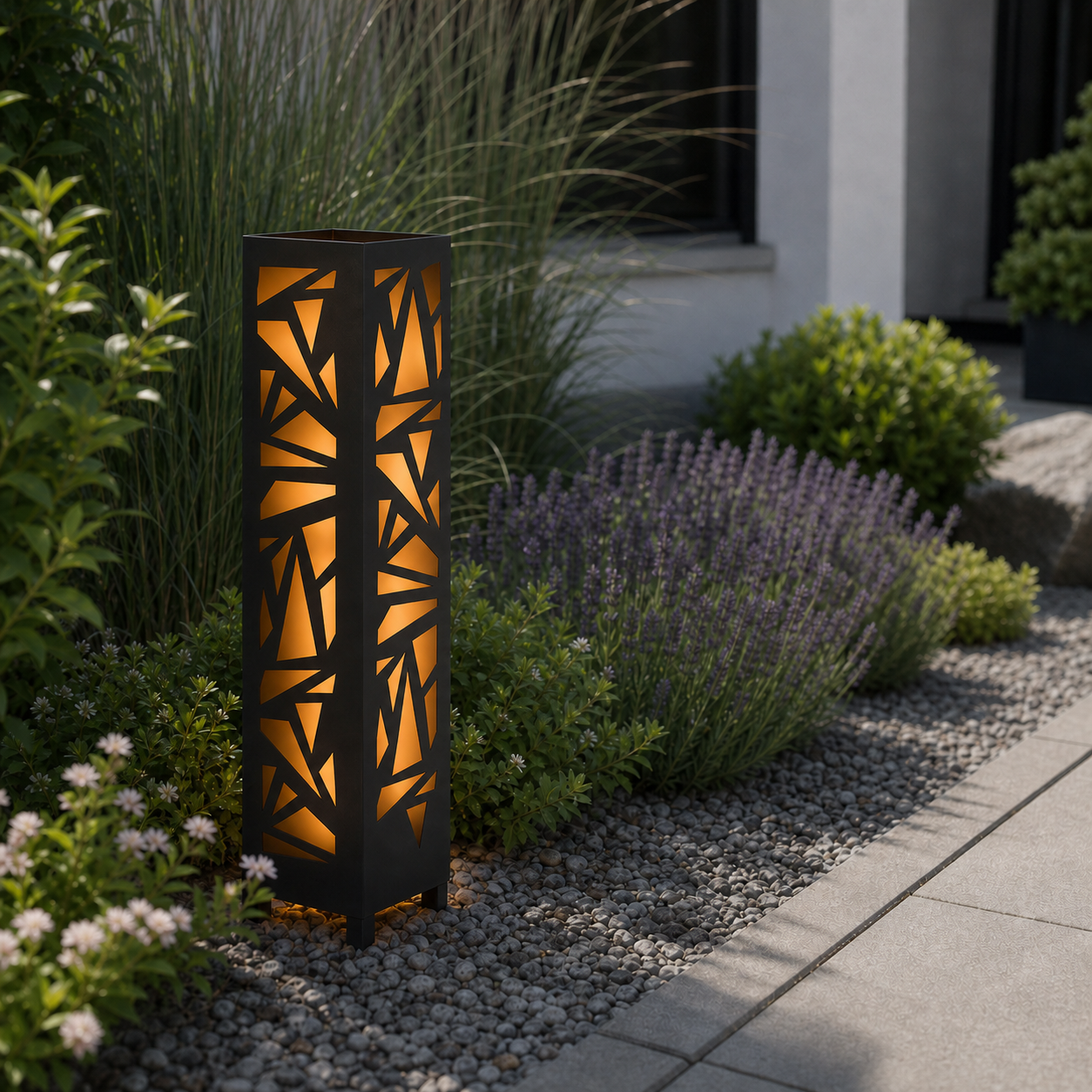 Design 138 laser cut garden light pillar installed in landscaped patio during daytime