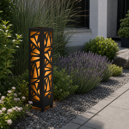 Design 138 laser cut garden light pillar installed in landscaped patio during daytime