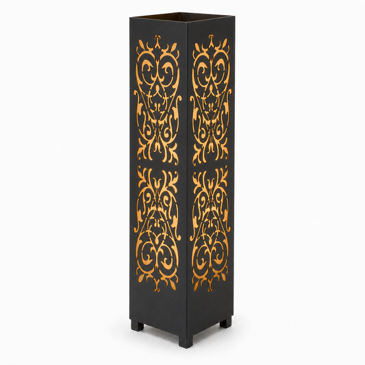 Design 147 black laser cut metal garden light tower with warm LED glow on white background