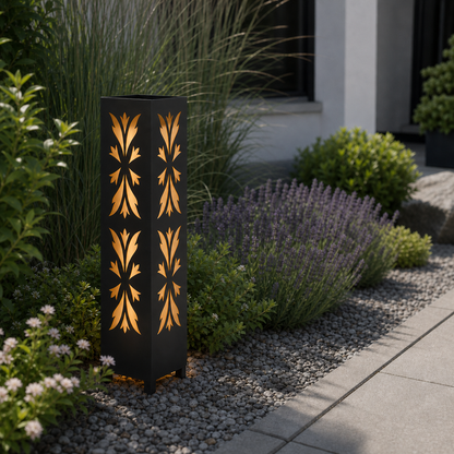 Design 149 laser cut garden light pillar installed in landscaped patio during daytime