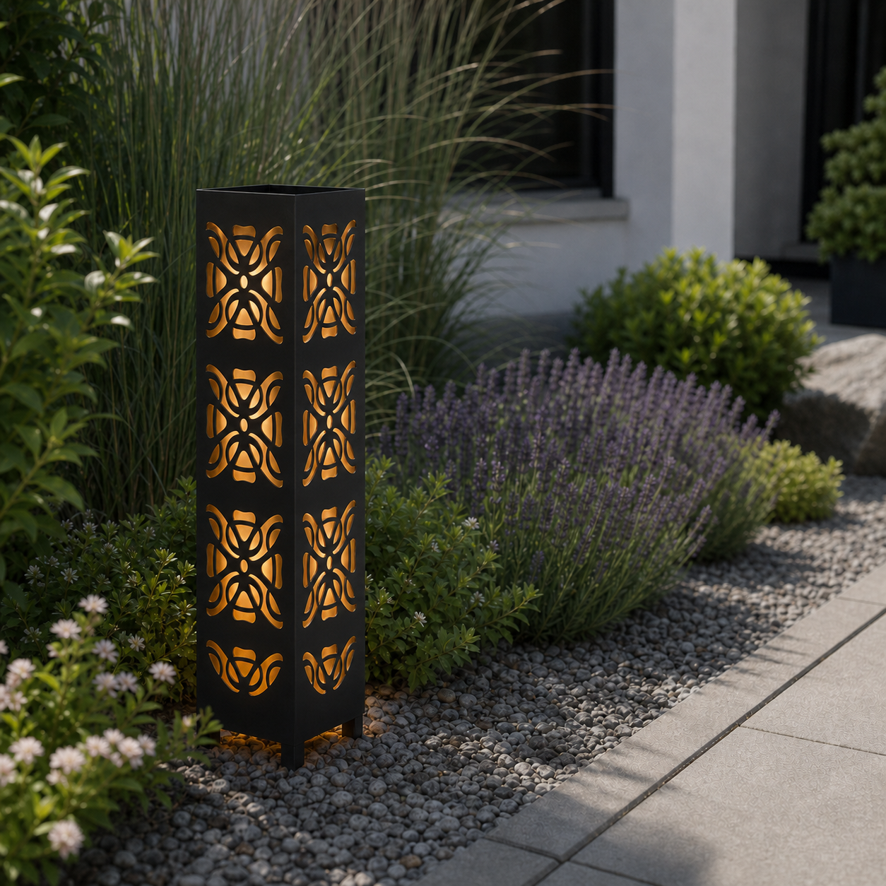 Design 153 laser cut garden light pillar installed in landscaped patio during daytime